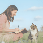 Woman and a cat learning how to be an animal intuitive